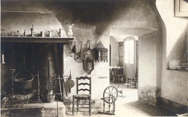 Featured is a real photo postcard depicting a wide array of antique and "very vintage" housewares and household necessities and accessories. The original postcard is for sale in The unltd.com Store.